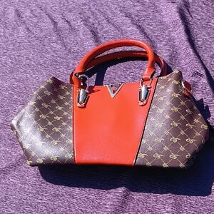 Elegant Red and Brown Handbag